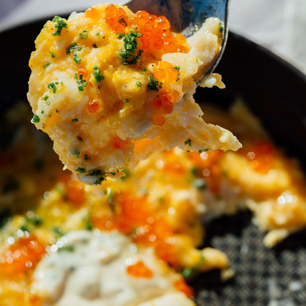 Scrambled eggs with spanner crab and YVC Smoked Salmon Pearls