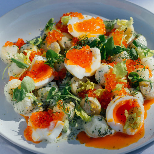 Warm potato, celery, and soft boiled eggs with Rainbow Trout Caviar