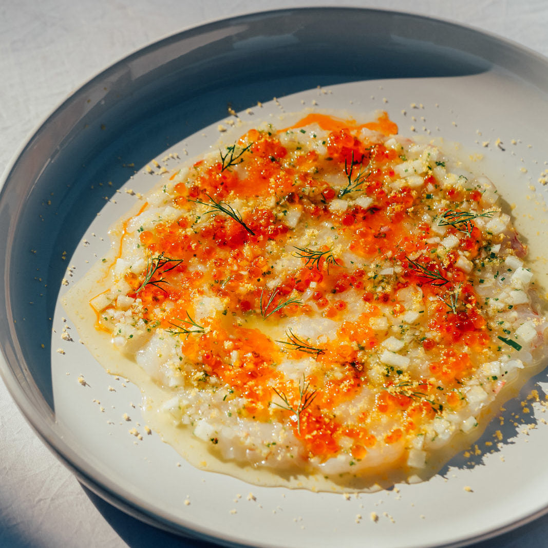 Scallop Crudo, green apple and YVC Atlantic Salmon Caviar