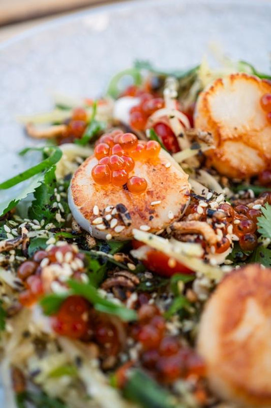 Thai salad of green papaya, fragrant herbs and roasted scallops, Ikura Shoyu Zuke Pearls