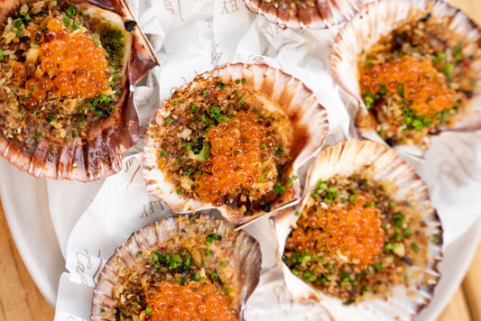 Baked Scallops with Lemon Chilli butter and Smoked Salmon Pearls