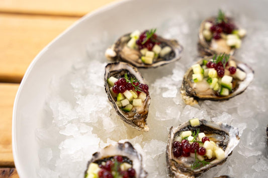 Pacific Oysters with green apple, cucumber and Bloody Shiraz Gin Pearls