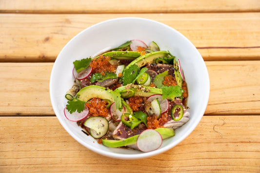 Seared Tuna, avocado, pickled radishes and Salmon Pearls