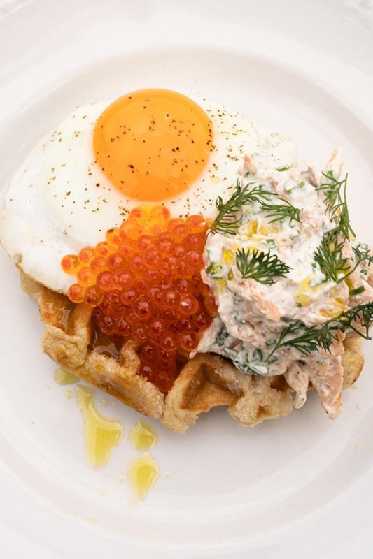 Warm potato waffles, Smoked Trout, Sunnyside egg and Rainbow Trout Pearls